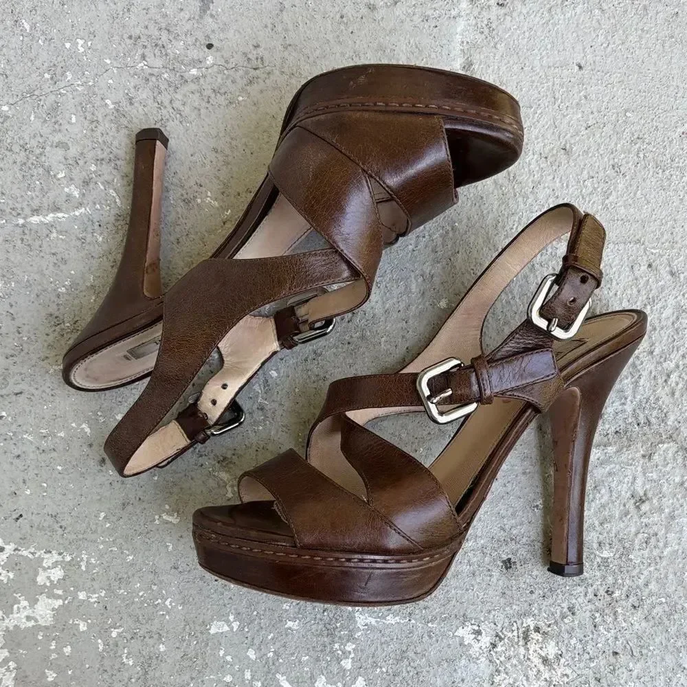 Prada crisscross open toe platforms